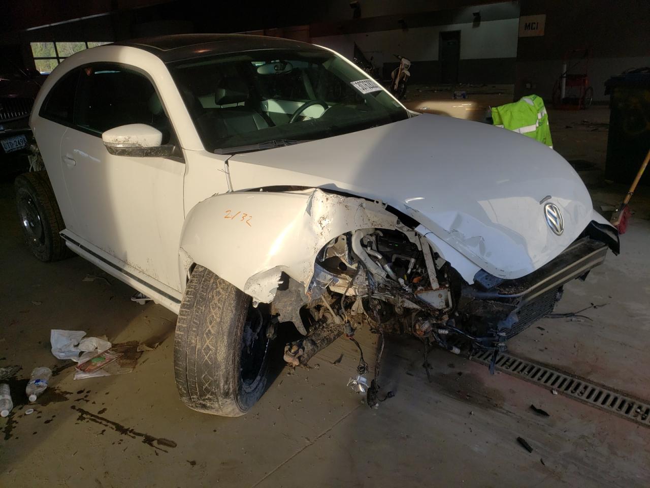Photo 9 from auction – 2012 VOLKSWAGEN BEETLE with VIN 3VWJX7AT8CM663543