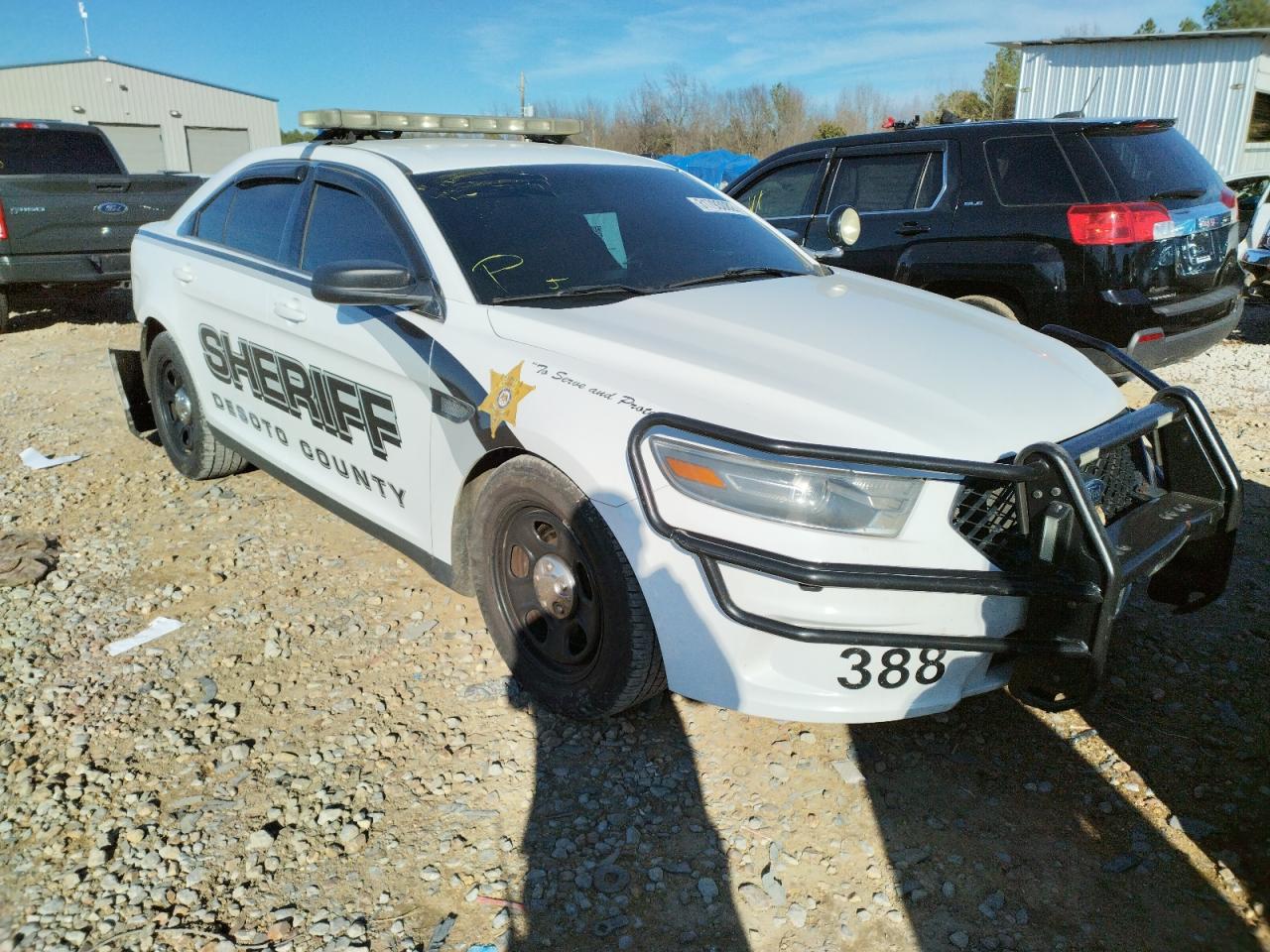 FORD TAURUS POL 2015 with VIN 1FAHP2MK9FG142388 - Photo from auction