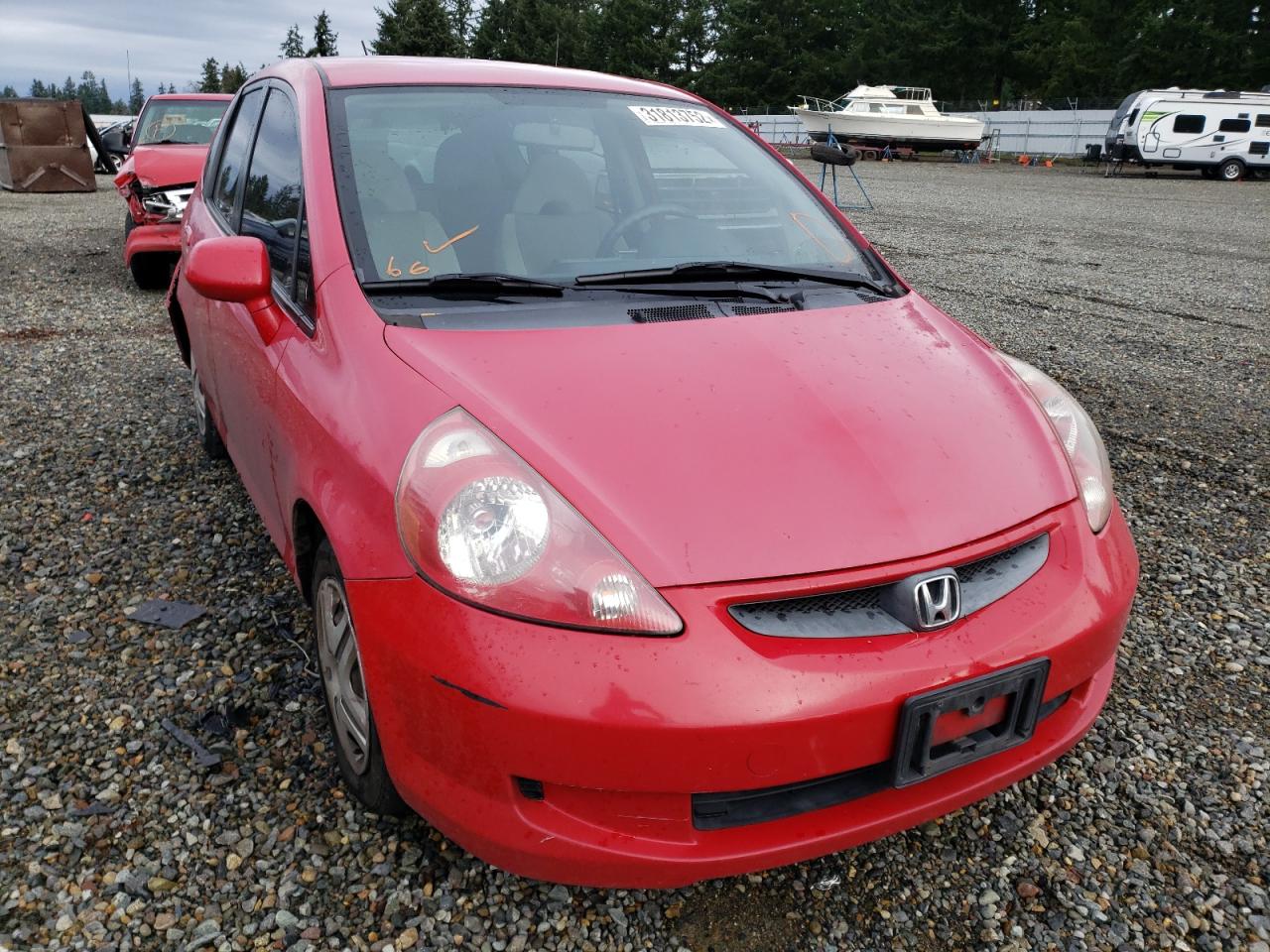 HONDA FIT 2007 with VIN JHMGD384X7S012228 - Photo from auction
