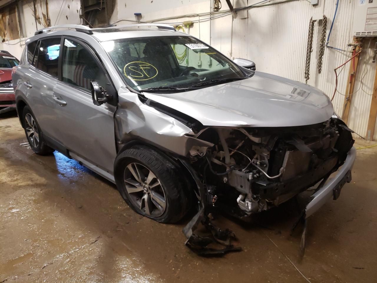 TOYOTA RAV4 XLE 2016 with VIN 2T3RFREV7GW489677 - Photo from auction