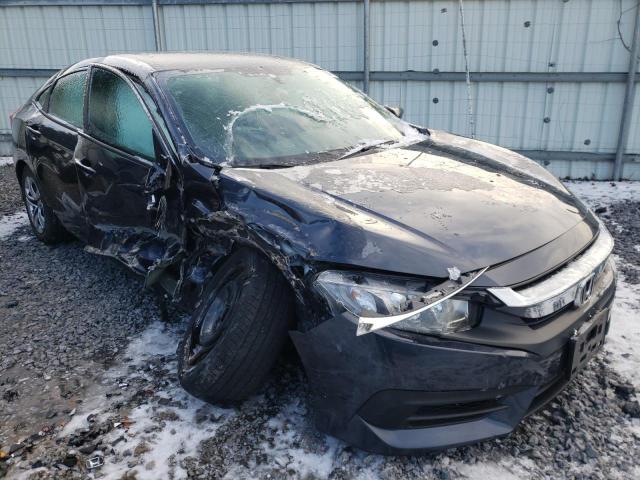HONDA CIVIC LX 2018 with VIN 19XFC2F52JE201861 - Photo from auction
