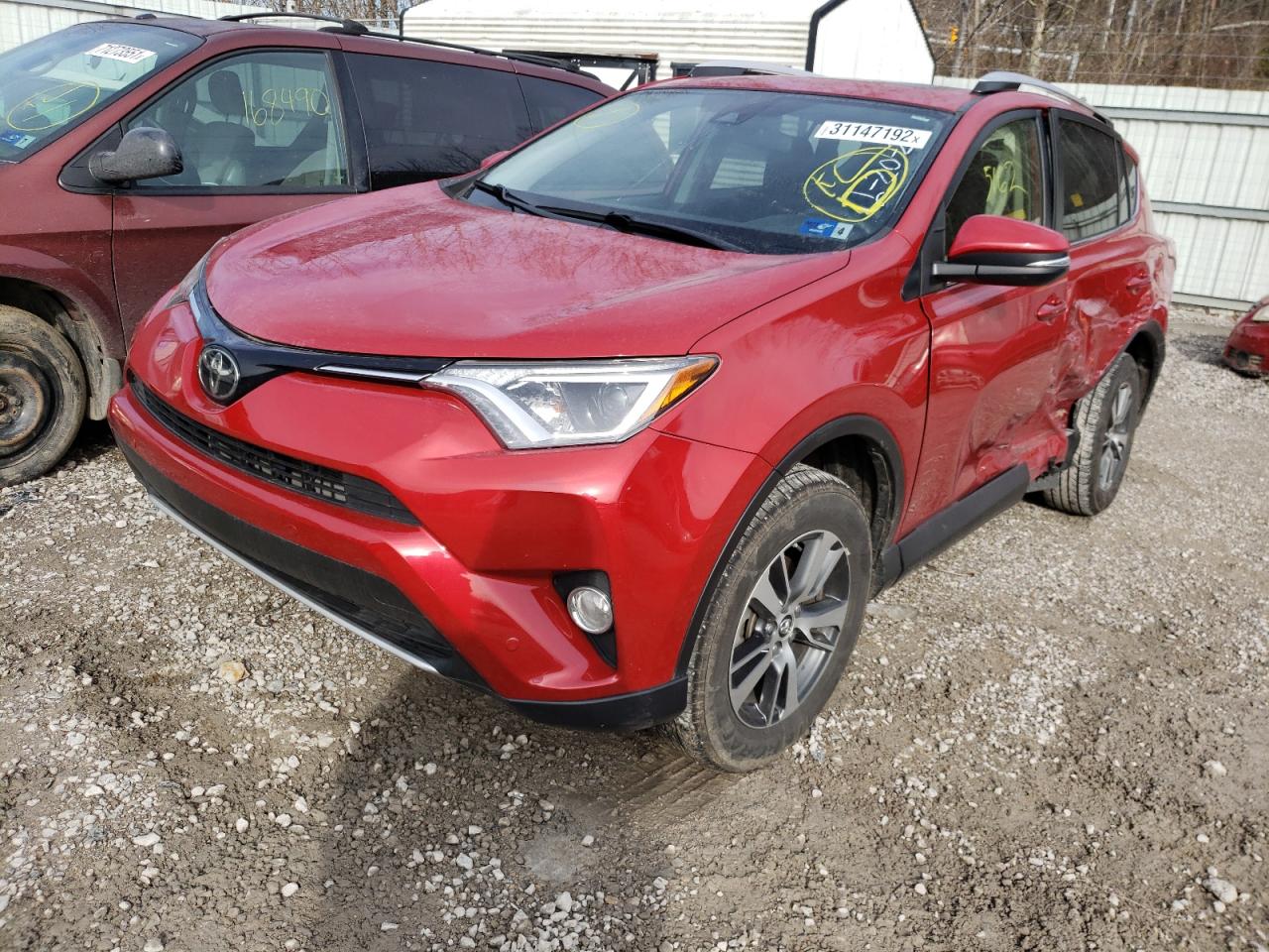 Photo 2 from auction – 2016 TOYOTA RAV4 XLE with VIN JTMRFREV0GJ067166