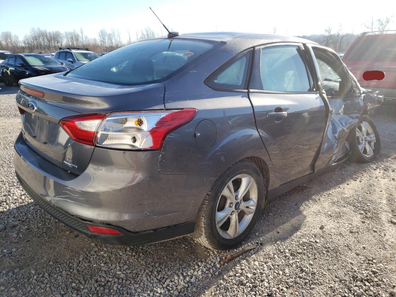 Photo 4 from auction – 2014 FORD FOCUS SE with VIN 1FADP3F23EL359507