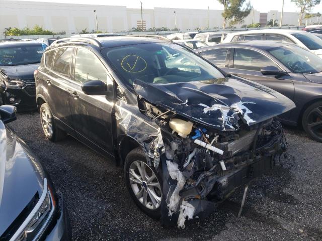 Photo 1 from auction – 2018 FORD ESCAPE SEL with VIN 1FMCU9HD8JUC56311