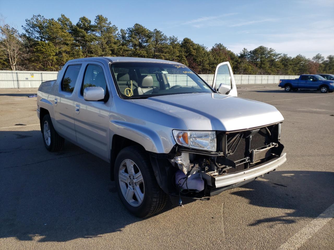 HONDA RIDGELINE 2012 with VIN 5FPYK1F58CB001089 - Photo from auction