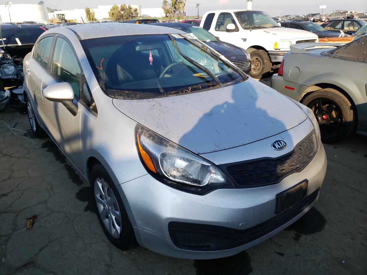 KIA RIO LX 2014 with VIN KNADM4A31E6385897 - Photo from auction