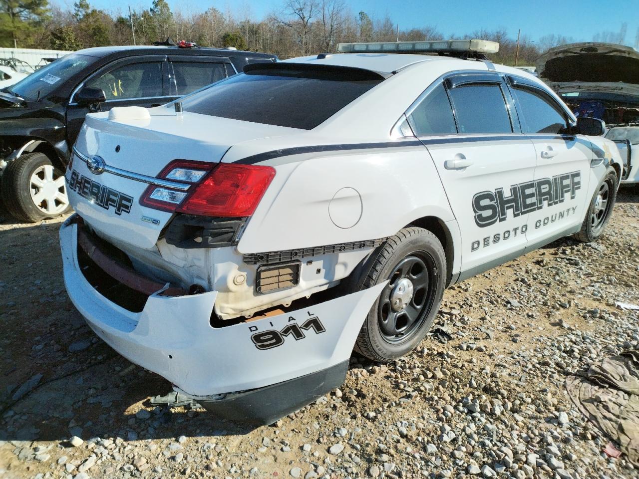 Photo 4 from auction – 2015 FORD TAURUS POL with VIN 1FAHP2MK9FG142388