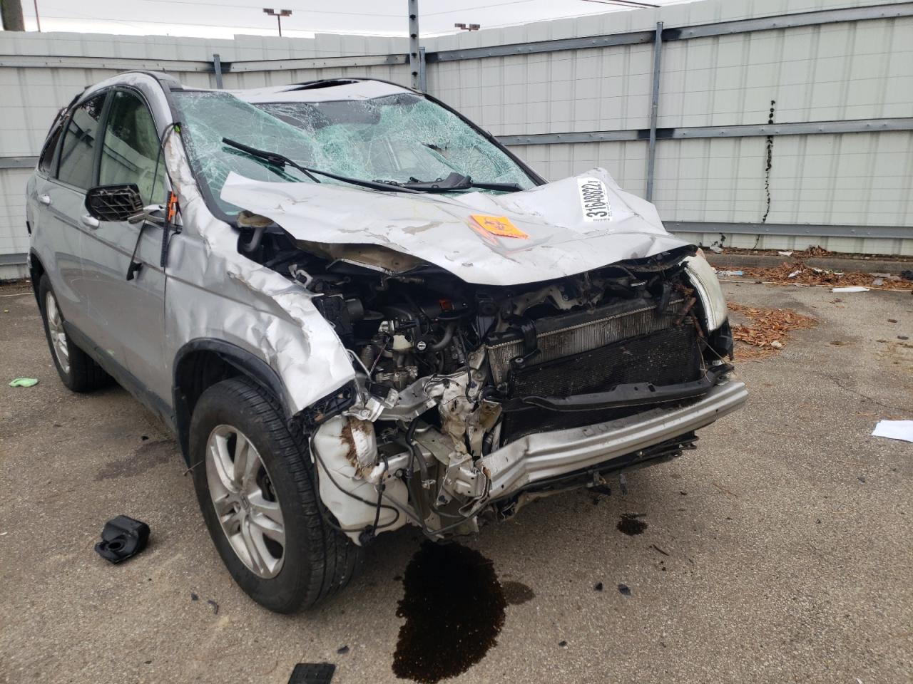 Photo 9 from auction – 2011 HONDA CR-V EXL with VIN 5J6RE3H73BL007192