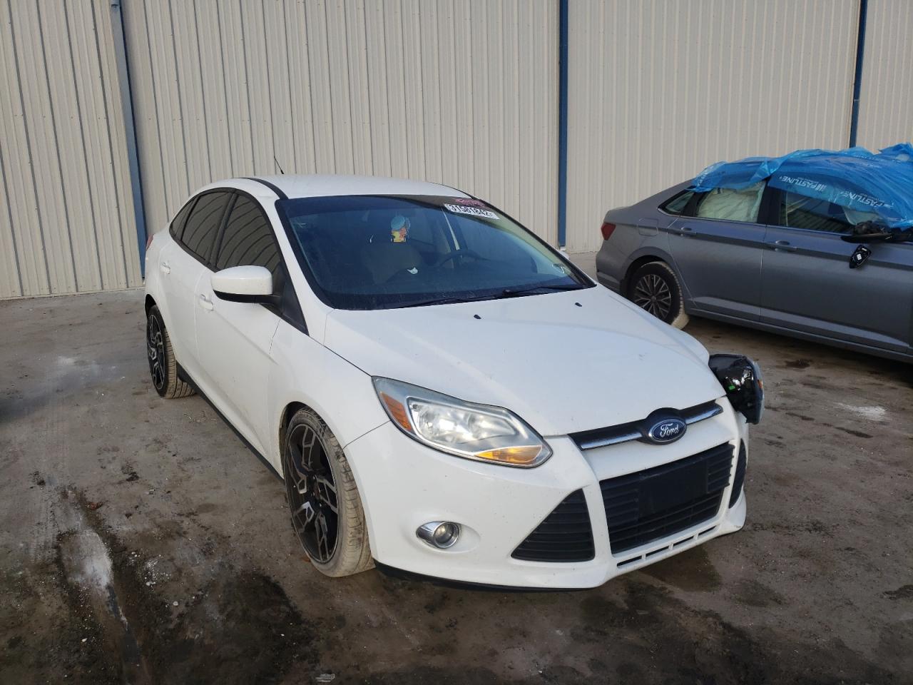 FORD FOCUS SE 2012 with VIN 1FAHP3F28CL367634 - Photo from auction