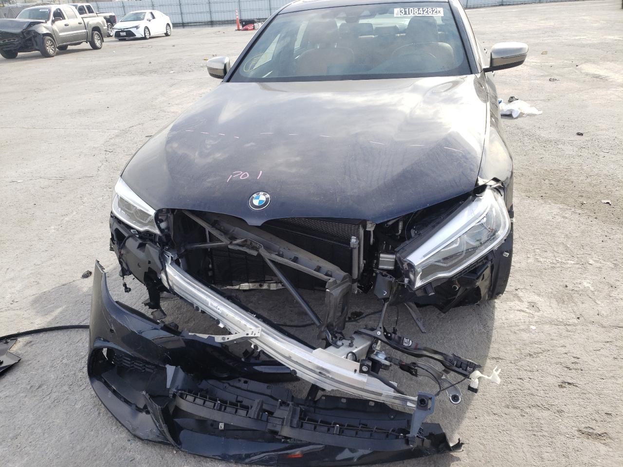 Photo 9 from auction – 2020 BMW M550XI with VIN WBAJS7C04LBN96142