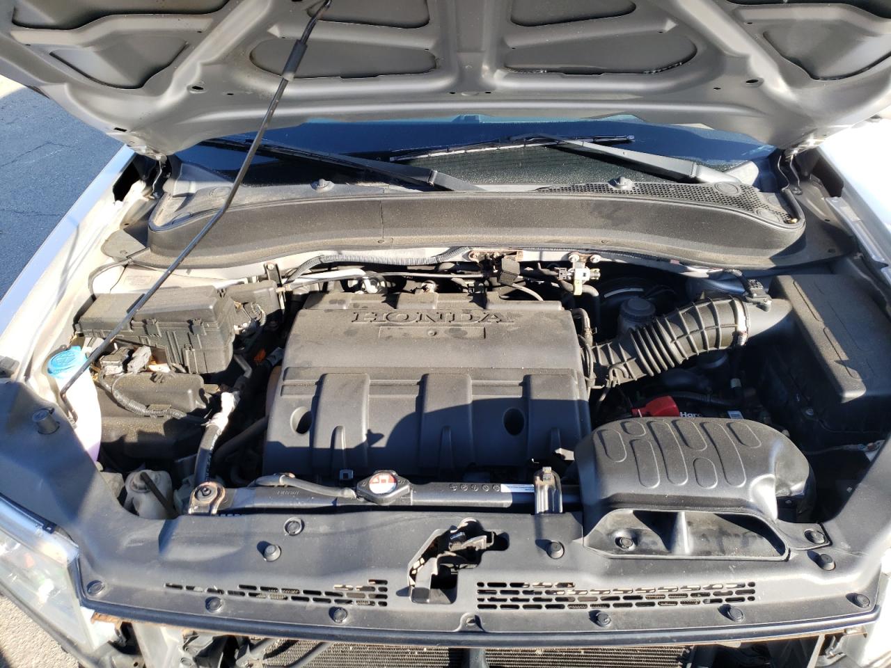 Photo 7 from auction – 2012 HONDA RIDGELINE with VIN 5FPYK1F58CB001089