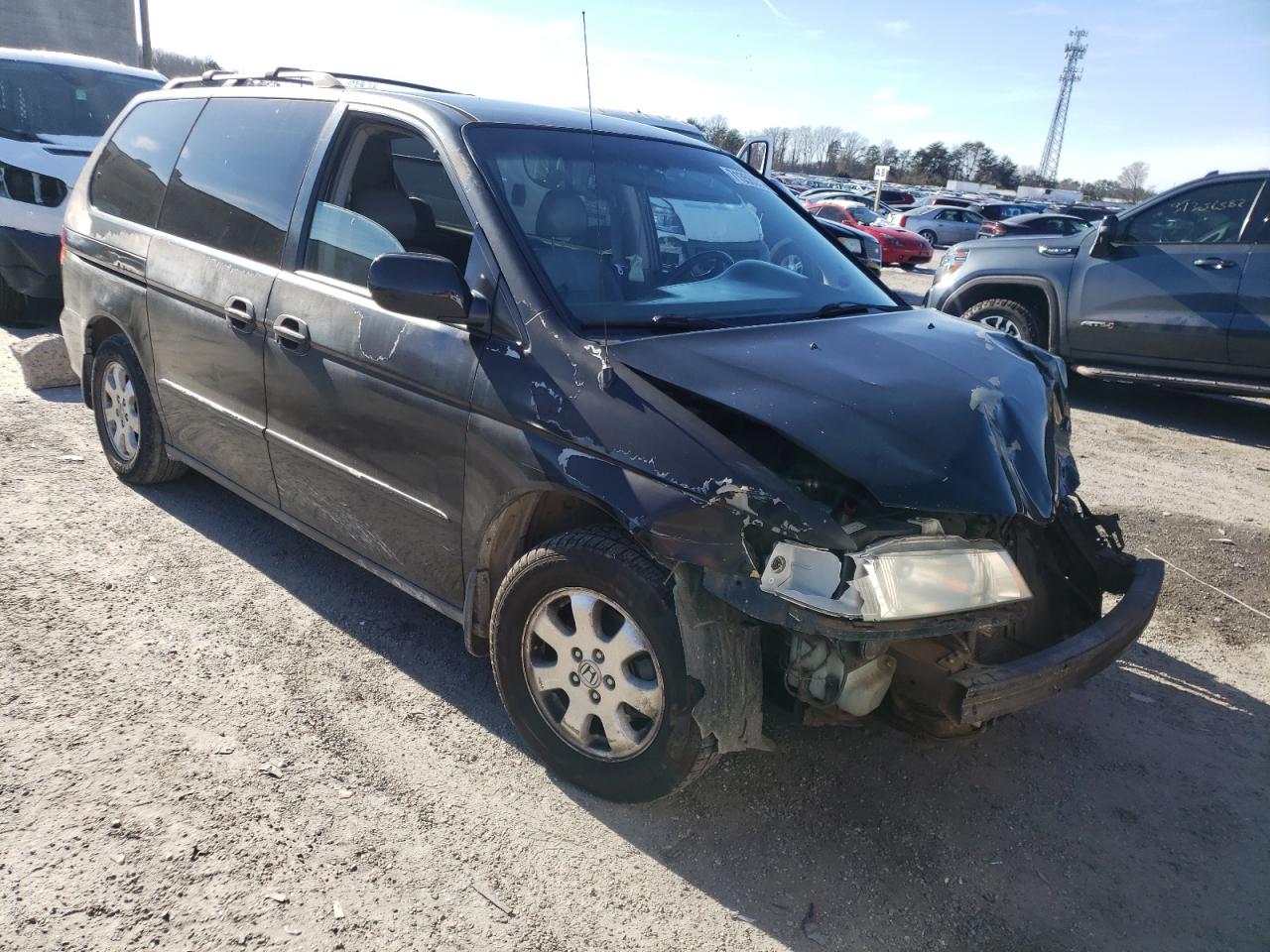 HONDA ODYSSEY EX 2003 with VIN 5FNRL18043B044131 - Photo from auction