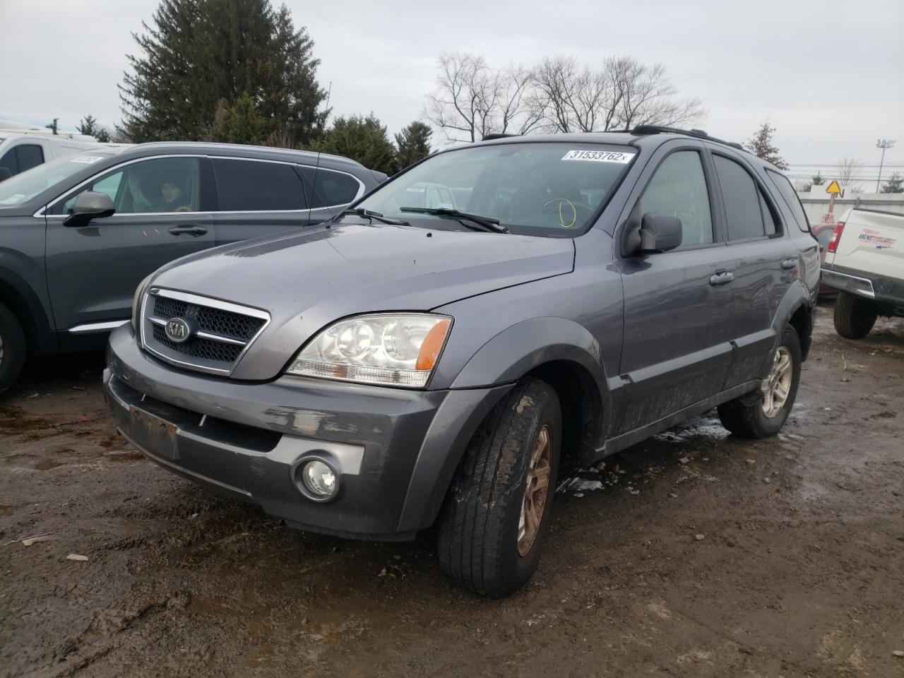 Photo 2 from auction – 2004 KIA SORENTO EX with VIN KNDJC733945325586