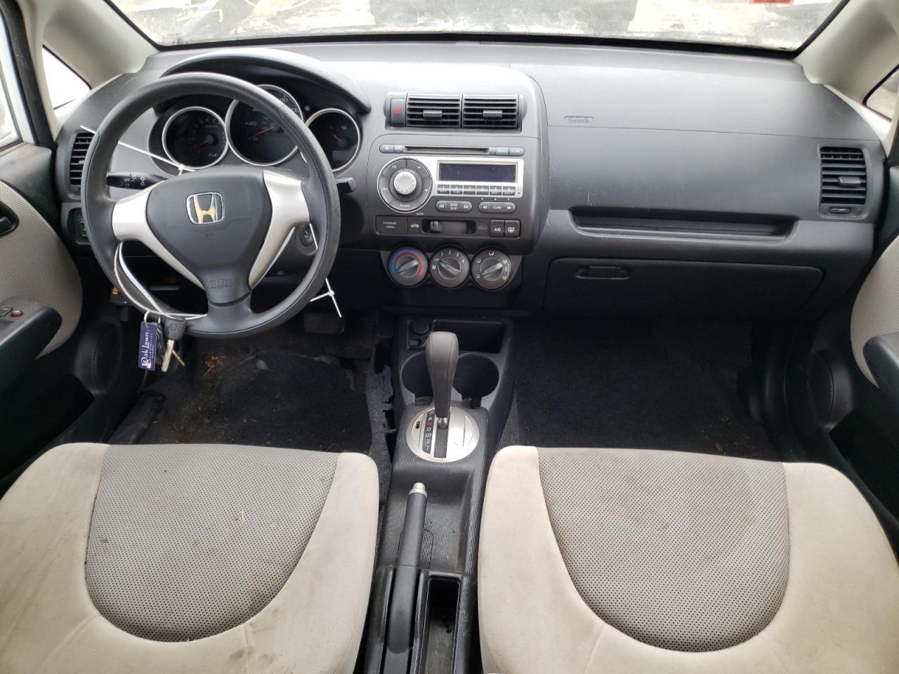 Photo 9 from auction – 2007 HONDA FIT with VIN JHMGD38447S030708