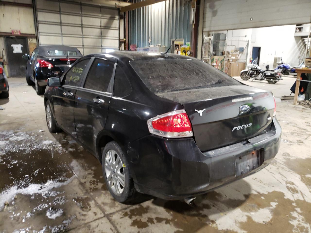 Photo 3 from auction – 2011 FORD FOCUS with VIN 1FAHP3HN7BW106516