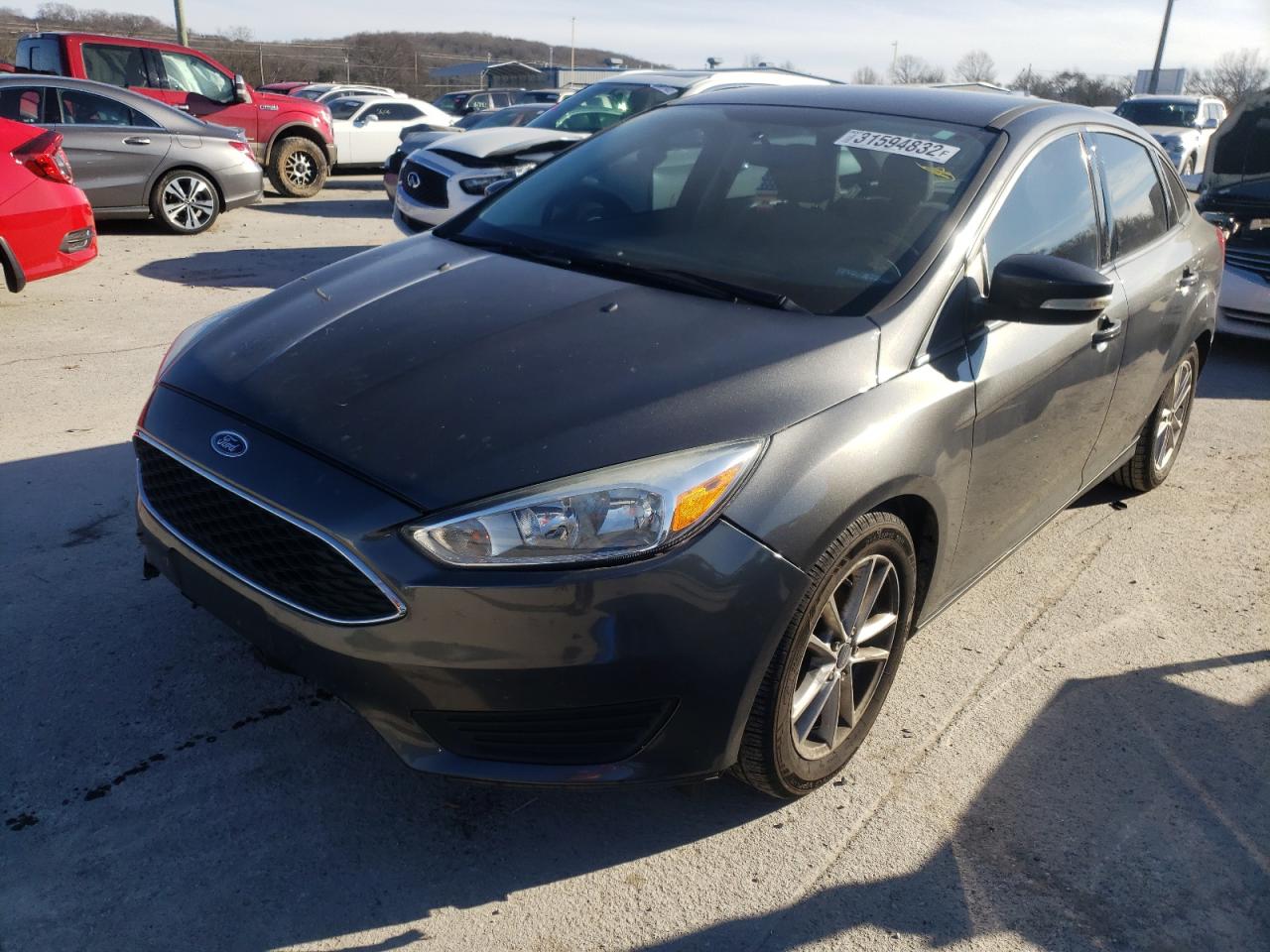 Photo 2 from auction – 2016 FORD FOCUS SE with VIN 1FADP3F29GL335330
