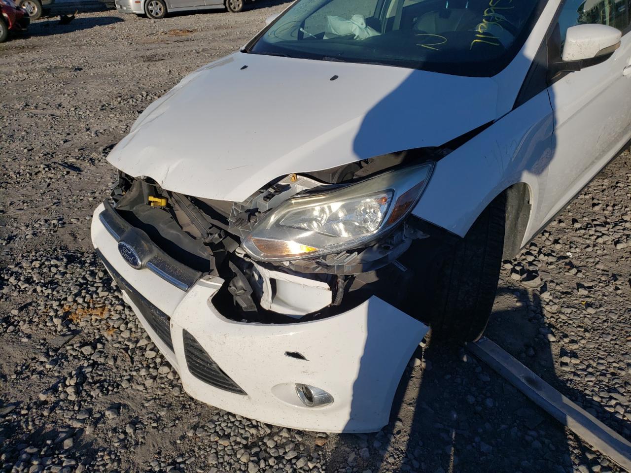 Фото 10 с аукциона – 2014 FORD FOCUS SE с VIN 1FADP3K2XEL324937