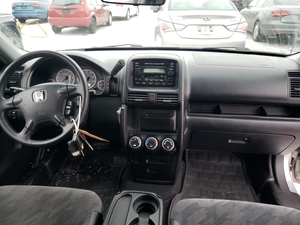 Photo 9 from auction – 2004 HONDA CR-V EX with VIN JHLRD78864C056935