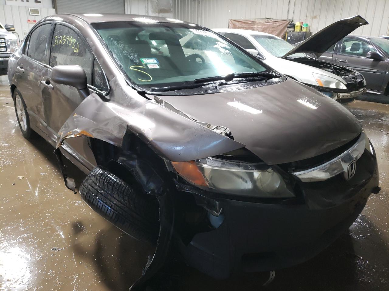 HONDA CIVIC LX 2011 with VIN 2HGFA1F56BH547385 - Photo from auction