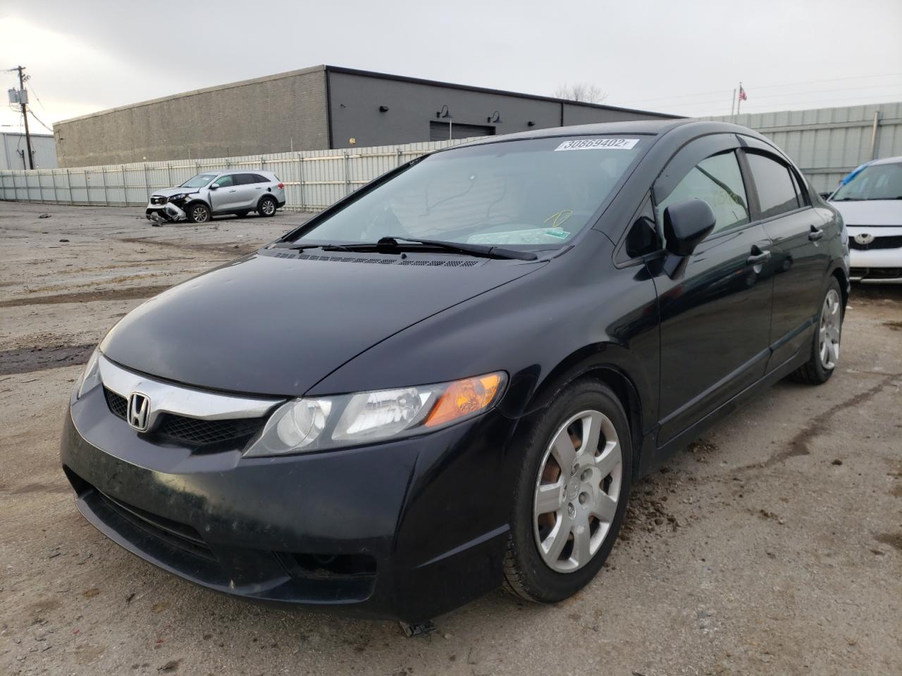 Photo 2 from auction – 2009 HONDA CIVIC LX with VIN 19XFA16539E039346