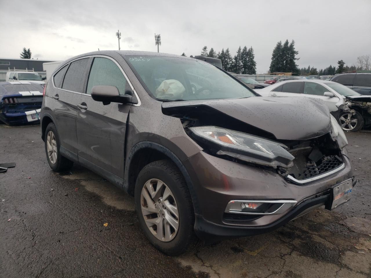 HONDA CR-V EX 2015 with VIN 2HKRM4H54FH707780 - Photo from auction