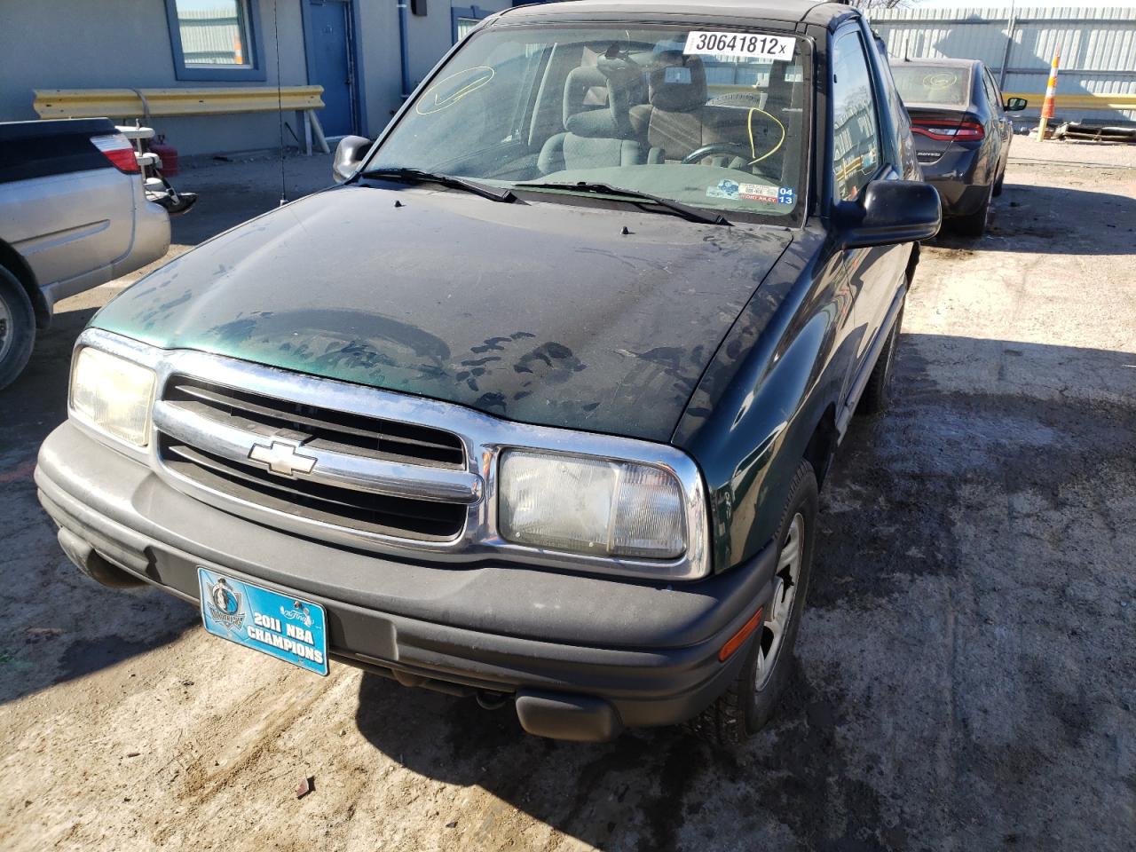 Photo 9 from auction – 2003 CHEVROLET TRACKER with VIN 2CNBJ18C936943148
