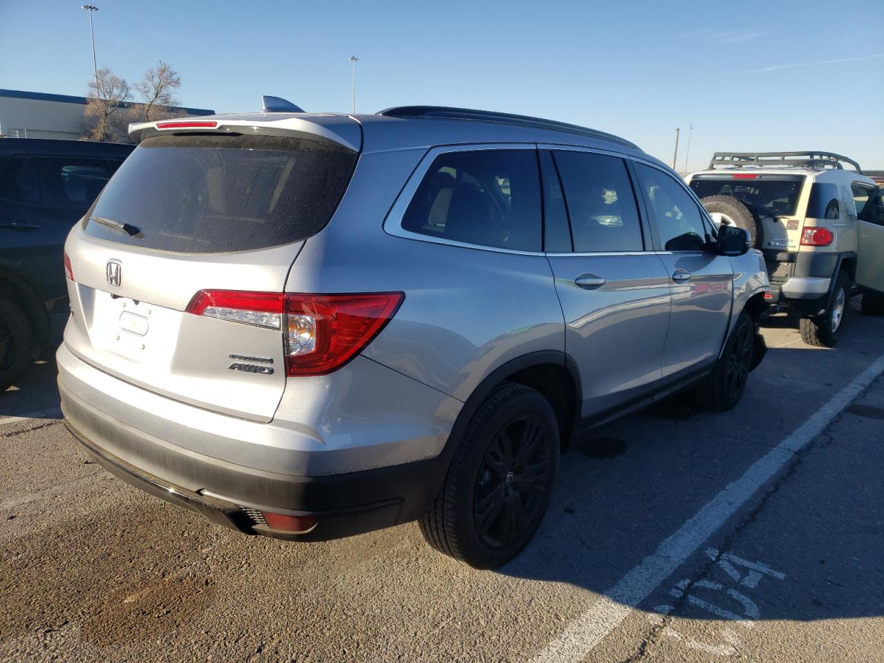 Photo 4 from auction – 2022 HONDA PILOT SE with VIN 5FNYF6H22NB011360