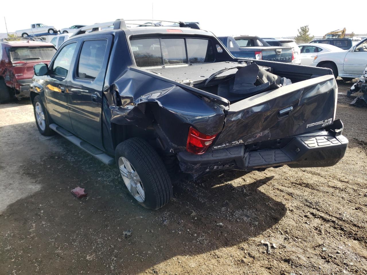 Photo 3 from auction – 2010 HONDA RIDGELINE with VIN 5FPYK1F5XAB003715