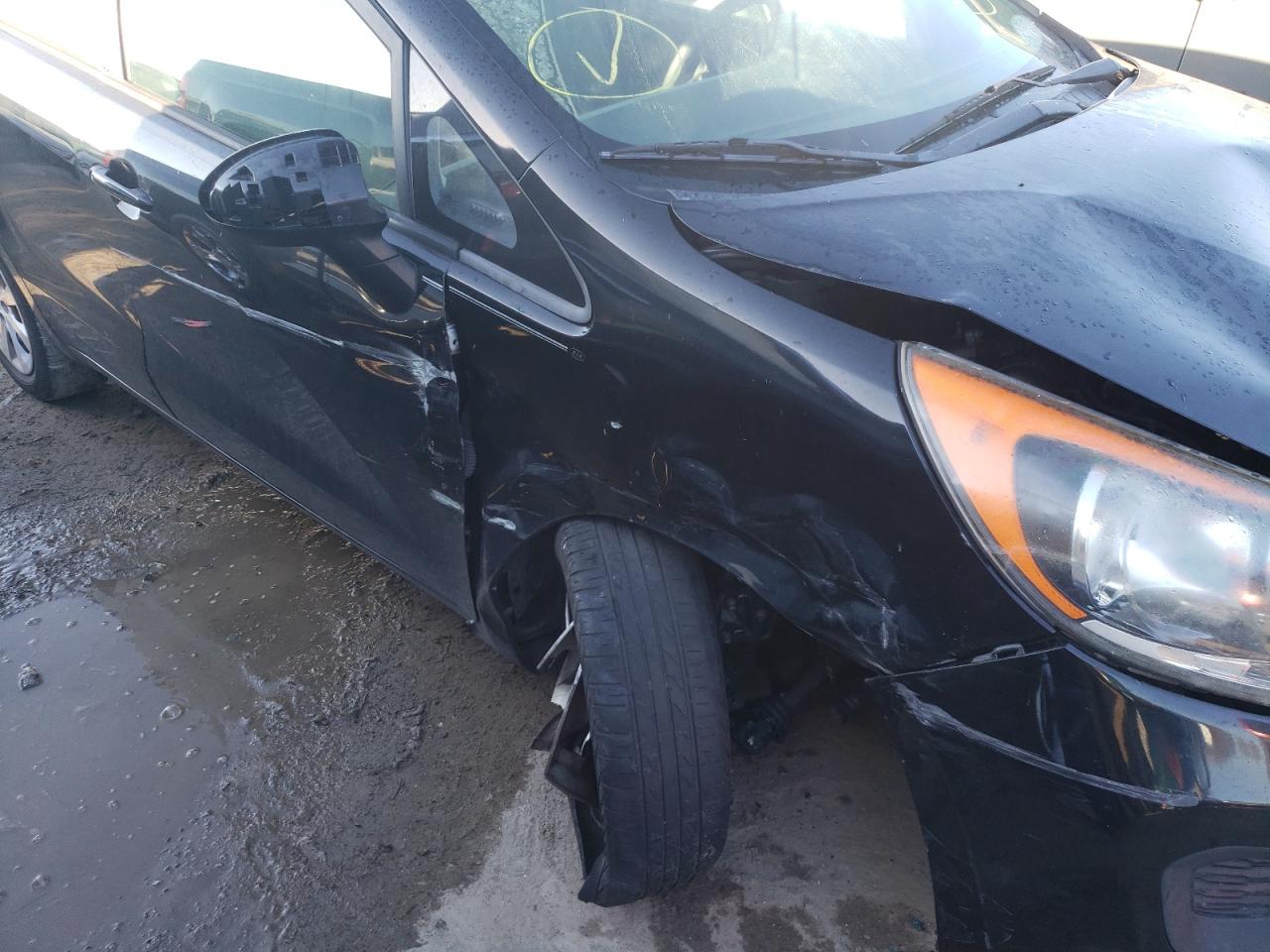 Photo 9 from auction – 2014 KIA RIO LX with VIN KNADM5A38E6401986