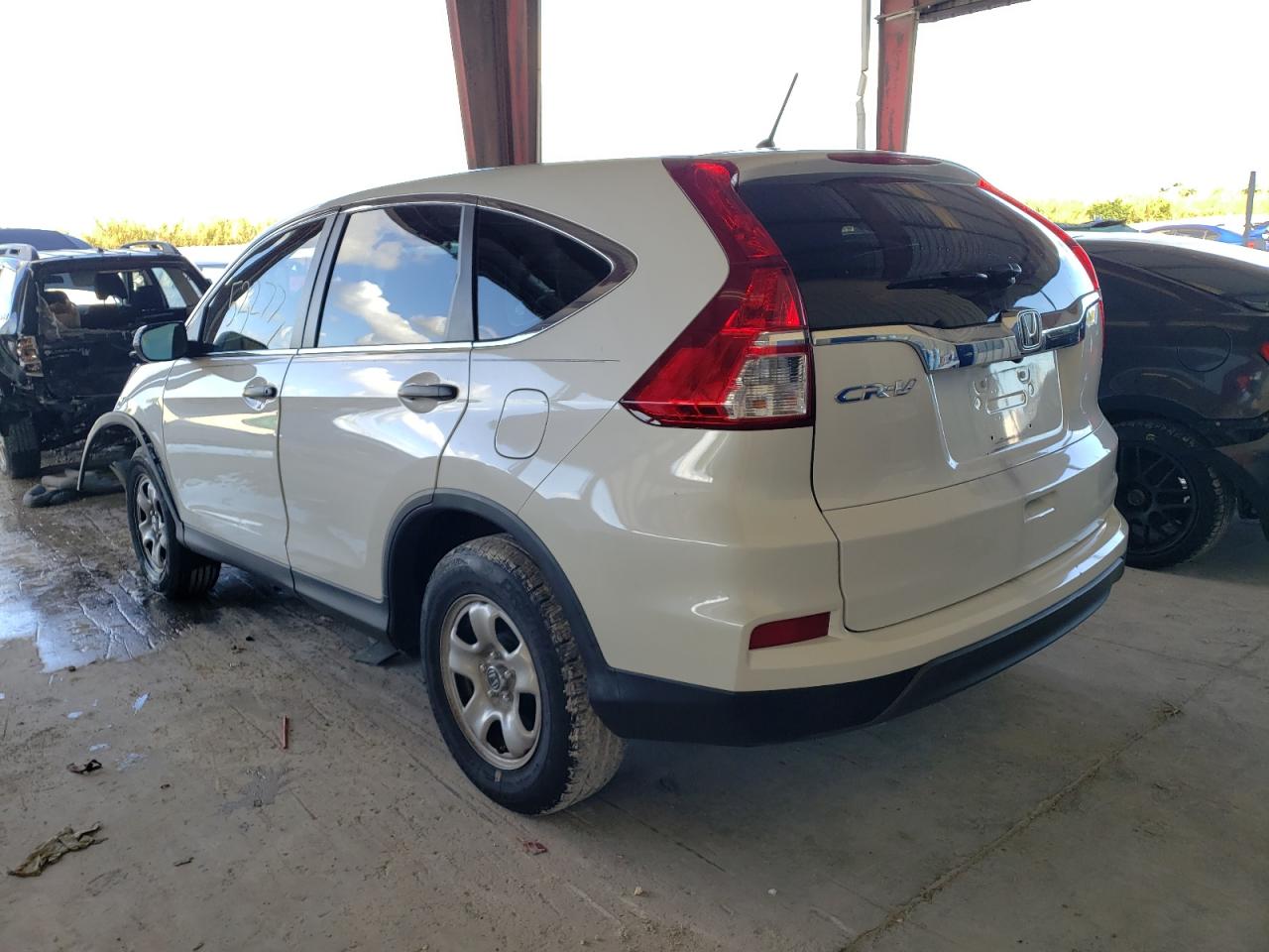 Photo 3 from auction – 2016 HONDA CR-V LX with VIN 5J6RM3H3XGL004698