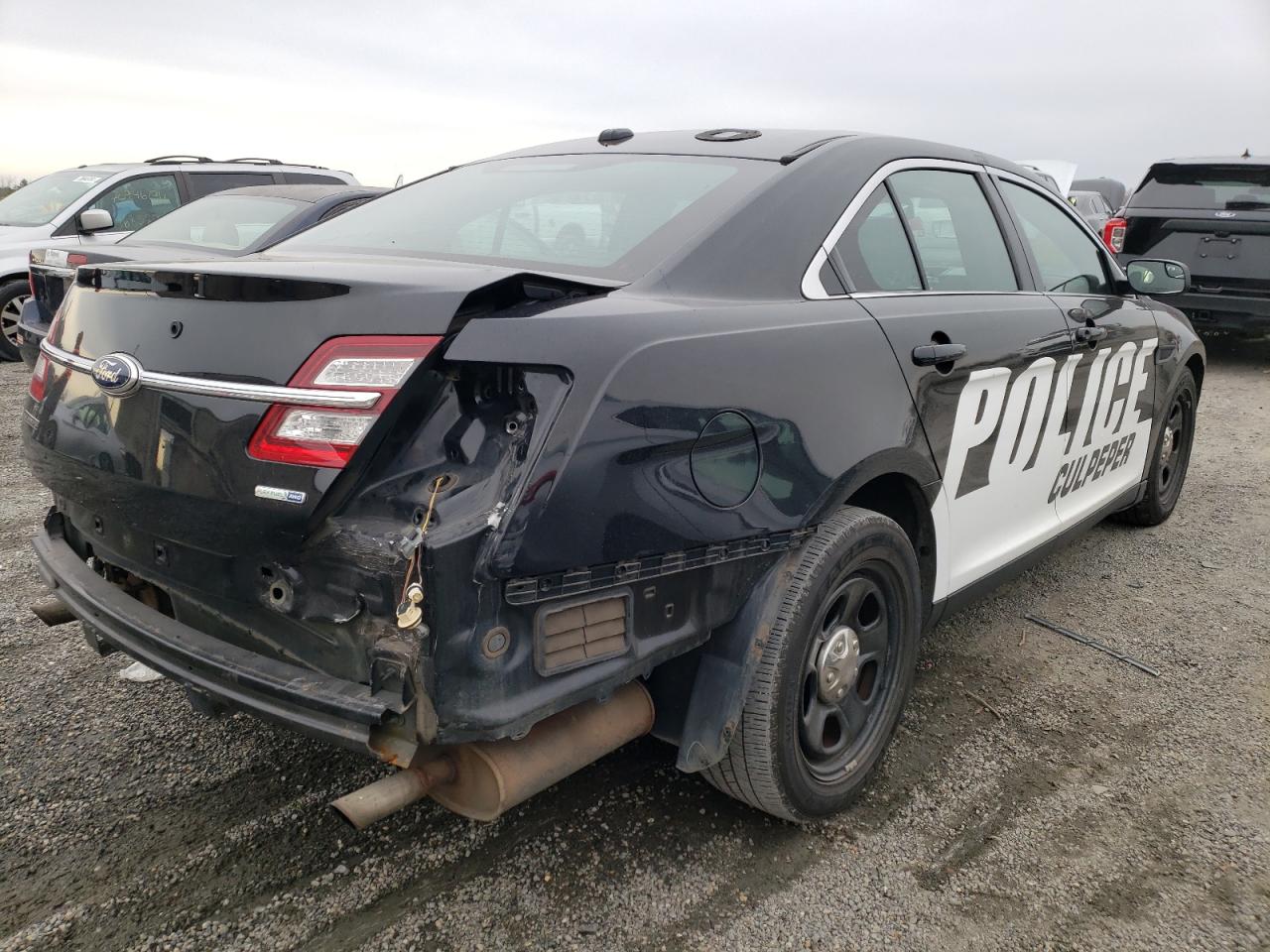 Photo 4 from auction – 2015 FORD TAURUS POL with VIN 1FAHP2MK4FG159793