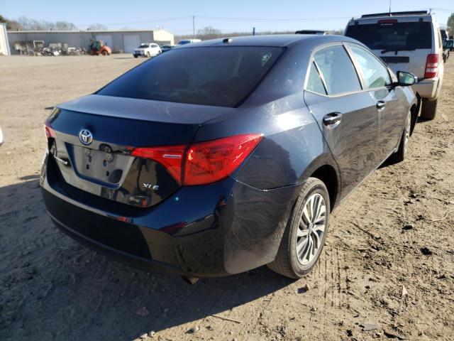 Photo 4 from auction – 2018 TOYOTA COROLLA with VIN 5YFBURHE0JP810396