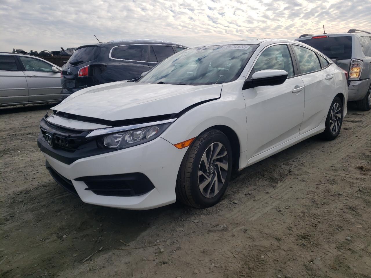 Photo 2 from auction – 2016 HONDA CIVIC EX with VIN 2HGFC2F77GH521872