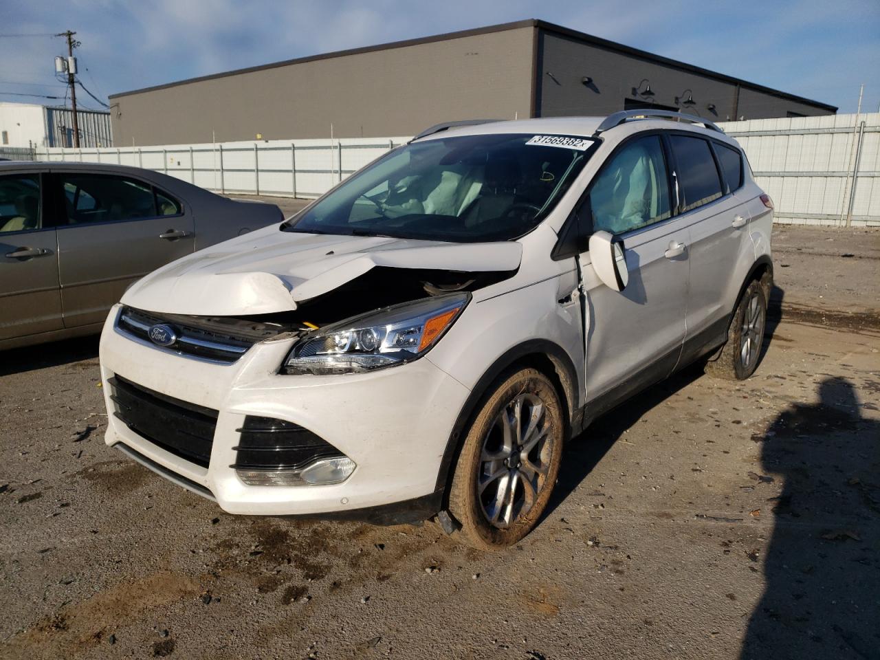 Photo 2 from auction – 2014 FORD ESCAPE TIT with VIN 1FMCU0JX9EUC99612
