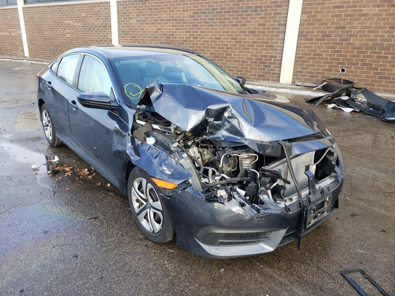 HONDA CIVIC LX 2017 with VIN 19XFC2F57HE211750 - Photo from auction