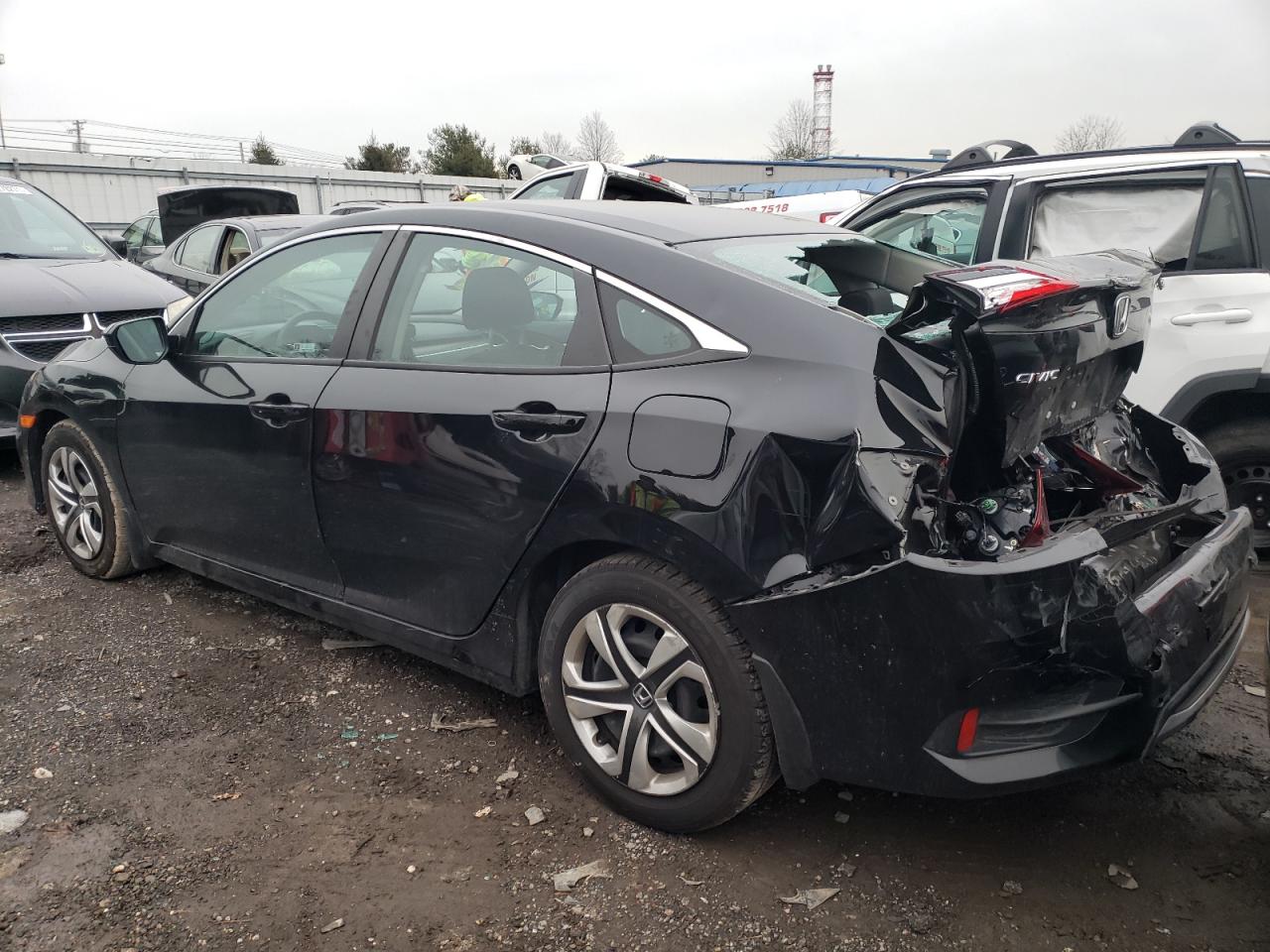 Photo 3 from auction – 2019 HONDA CIVIC LX with VIN 2HGFC2F65KH565708