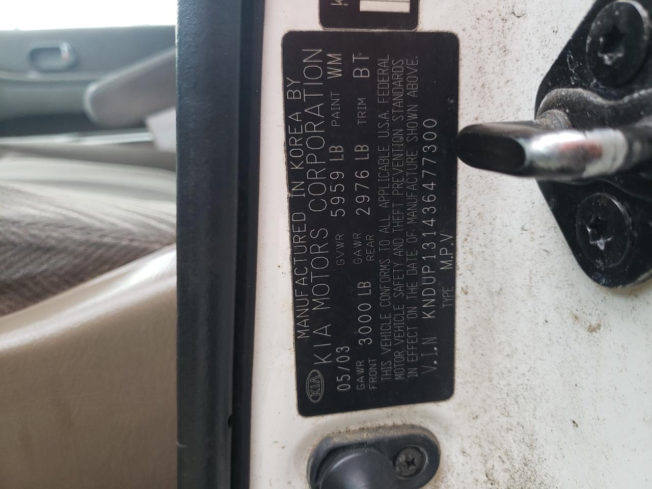 Photo 10 from auction – 2003 KIA SEDONA EX with VIN KNDUP131436477300