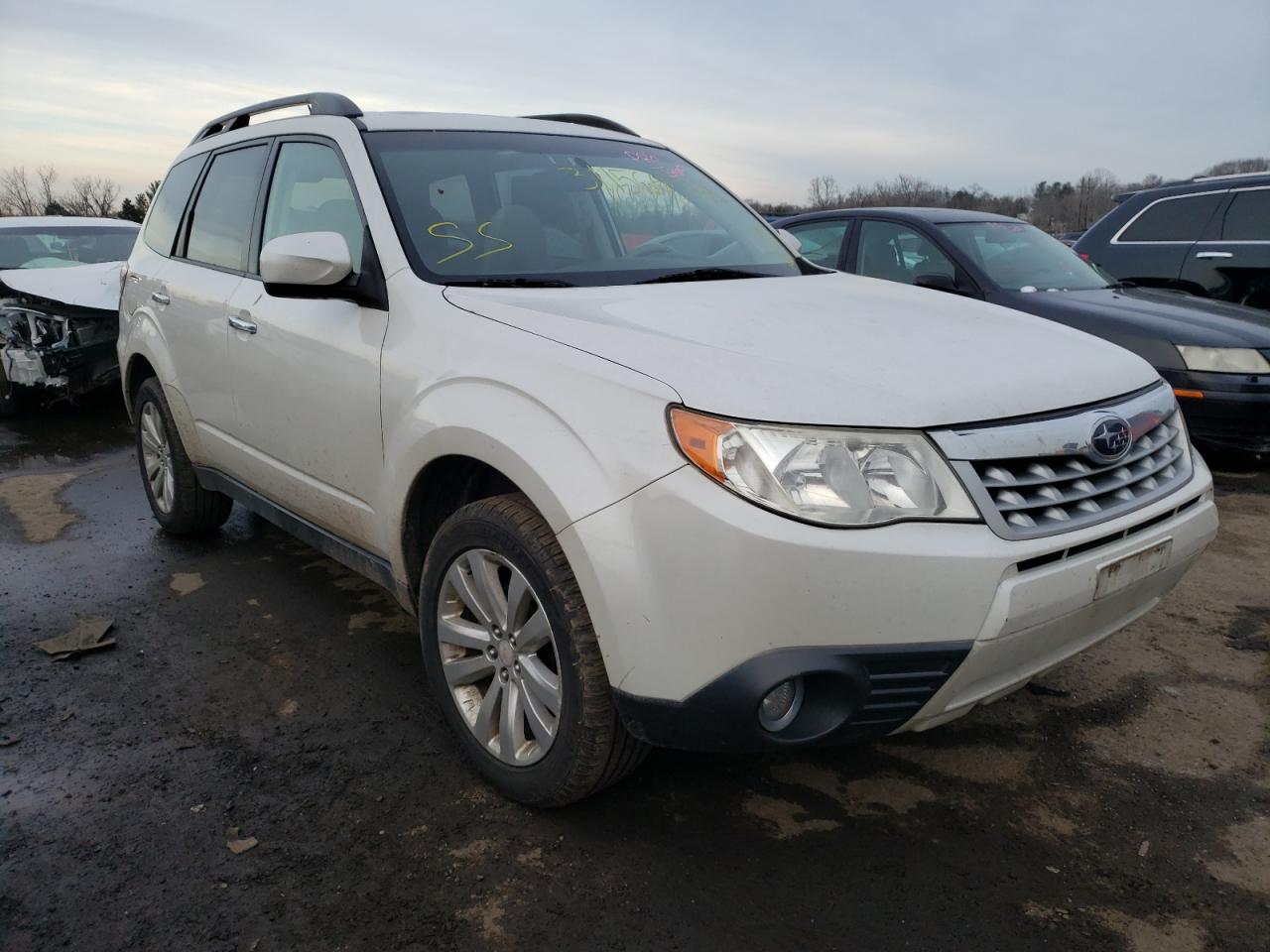 SUBARU FORESTER L 2011 with VIN JF2SHAFC2BH731432 - Photo from auction