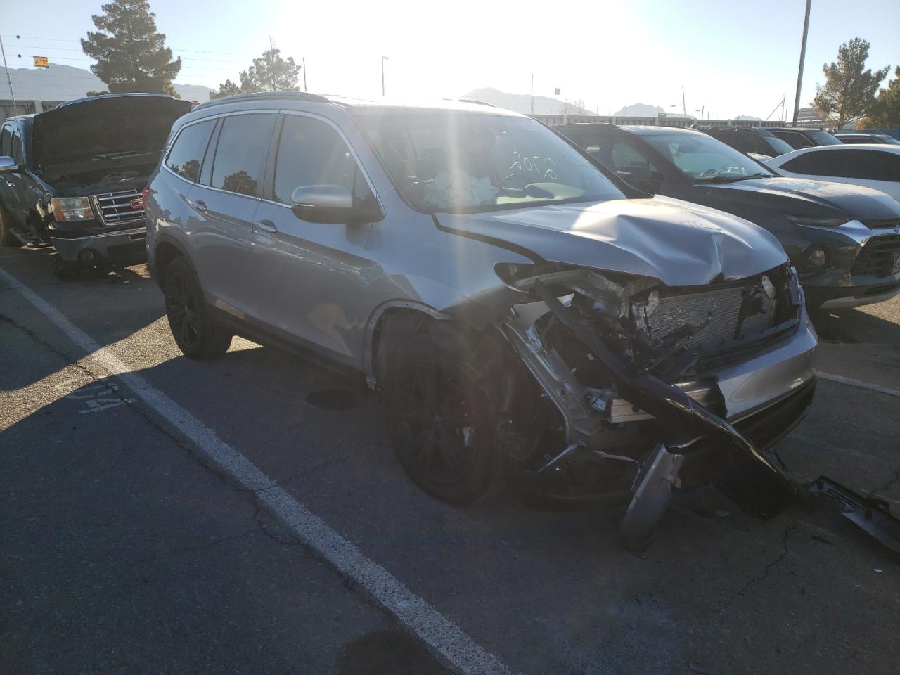 HONDA PILOT SE 2022 with VIN 5FNYF6H22NB011360 - Photo from auction