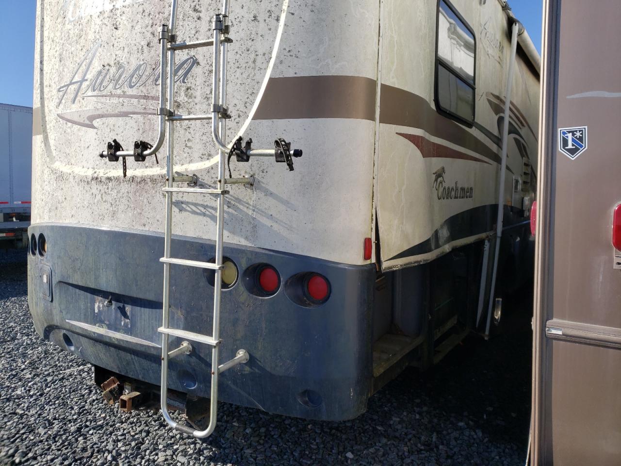 Photo 9 from auction – 2005 COACH AURORA with VIN 1F6NF53S240A05952