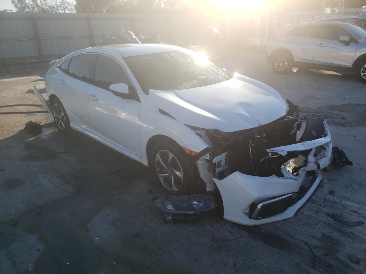 HONDA CIVIC LX 2020 with VIN 19XFC2F66LE004932 - Photo from auction