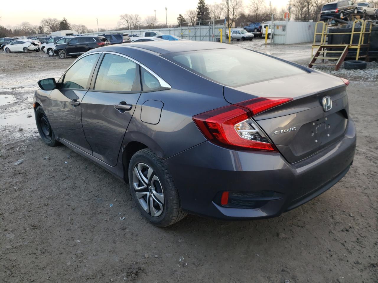 Photo 3 from auction – 2017 HONDA CIVIC LX with VIN 2HGFC2F50HH557399