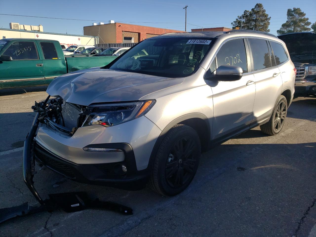 Photo 2 from auction – 2022 HONDA PILOT SE with VIN 5FNYF6H22NB011360