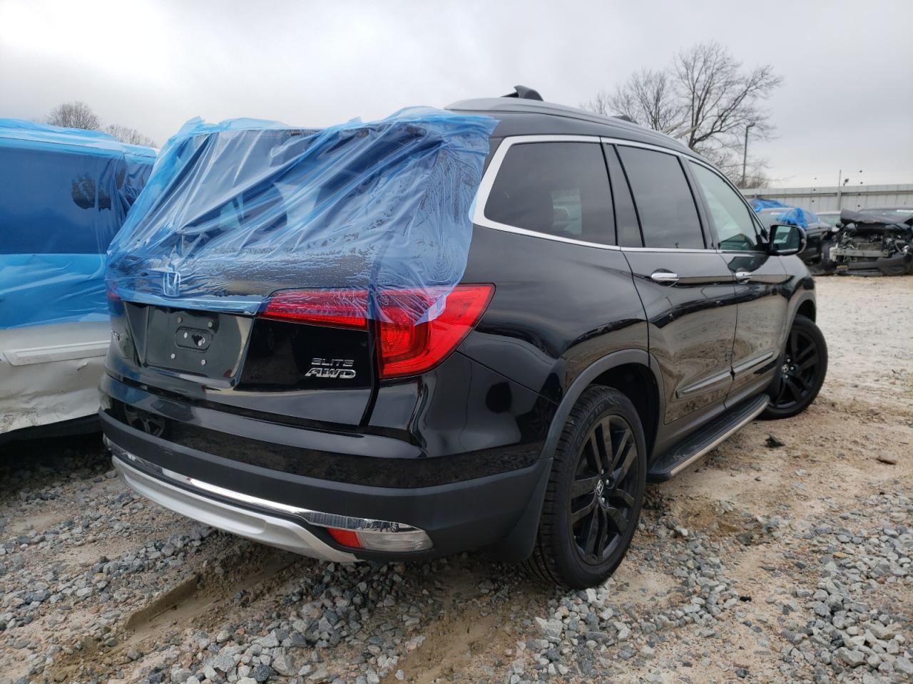 Photo 3 from auction – 2017 HONDA PILOT ELIT with VIN 5FNYF6H06HB037625