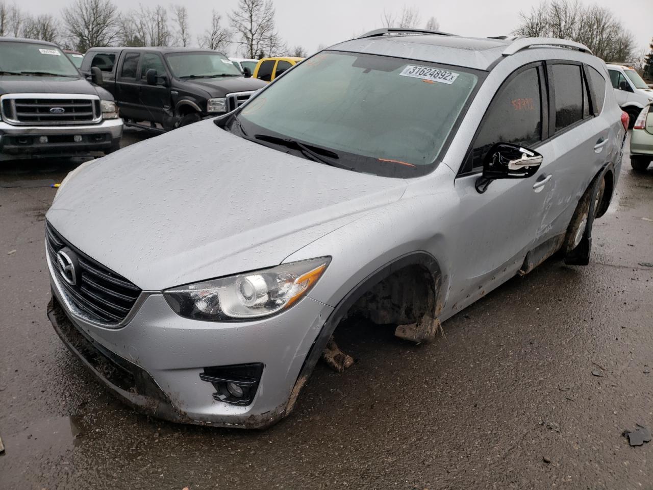Photo 2 from auction – 2016 MAZDA CX-5 TOURI with VIN JM3KE2CYXG0660362