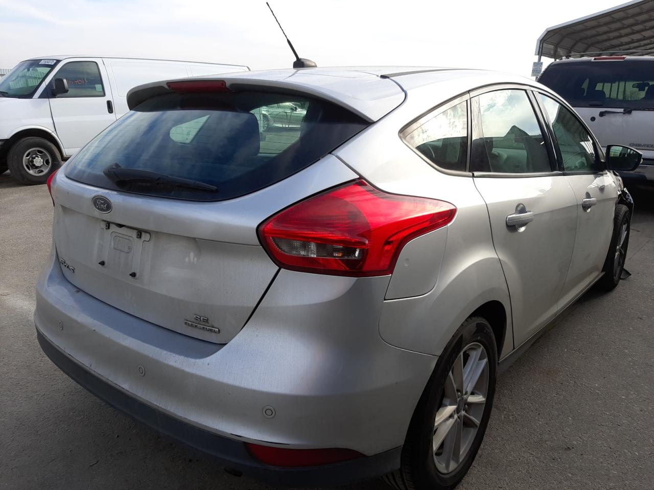 Photo 4 from auction – 2015 FORD FOCUS SE with VIN 1FADP3K29FL351029