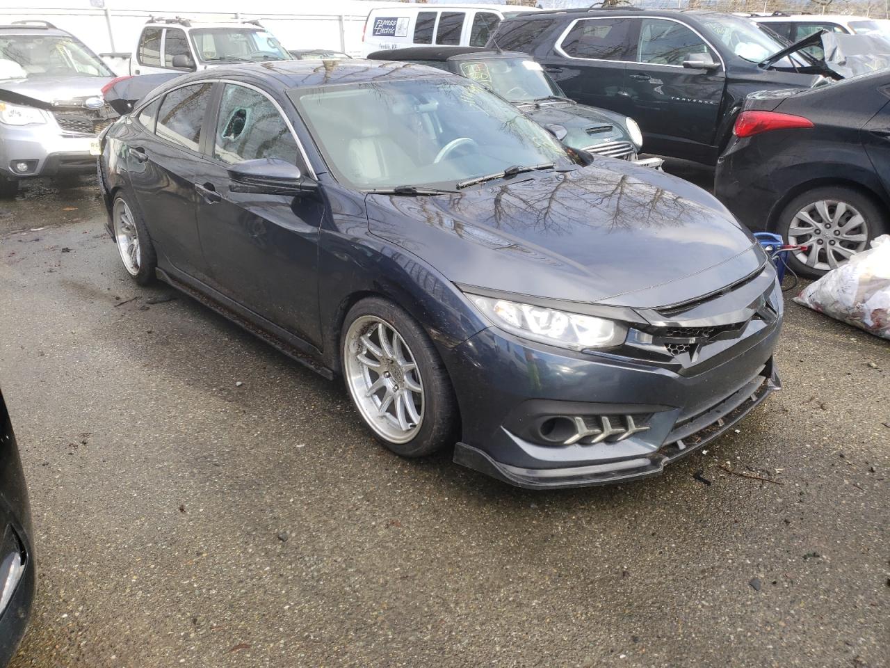 HONDA CIVIC EX 2017 with VIN 2HGFC2F79HH523415 - Photo from auction