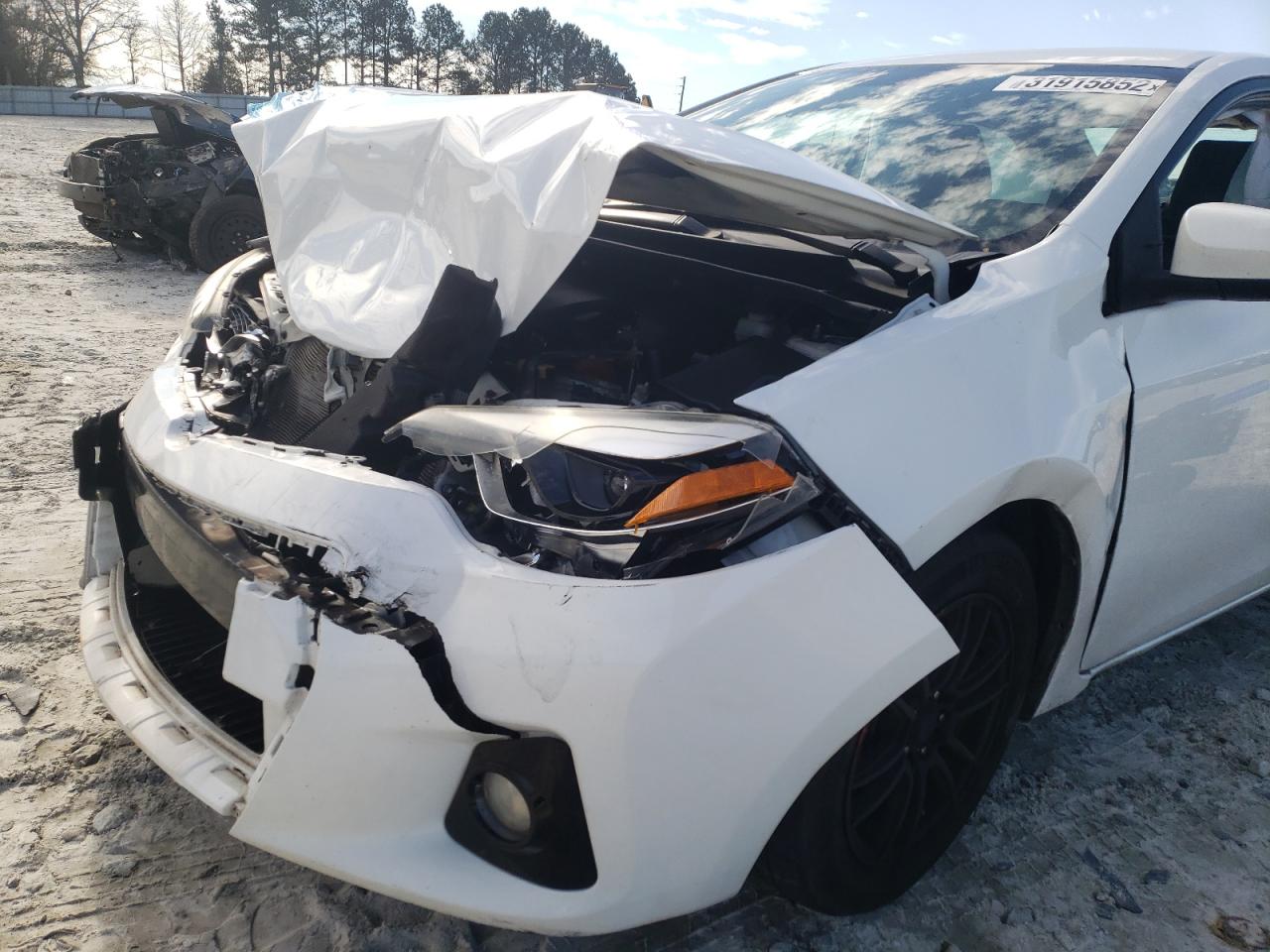 Photo 9 from auction – 2014 TOYOTA COROLLA L with VIN 2T1BURHE2EC099953