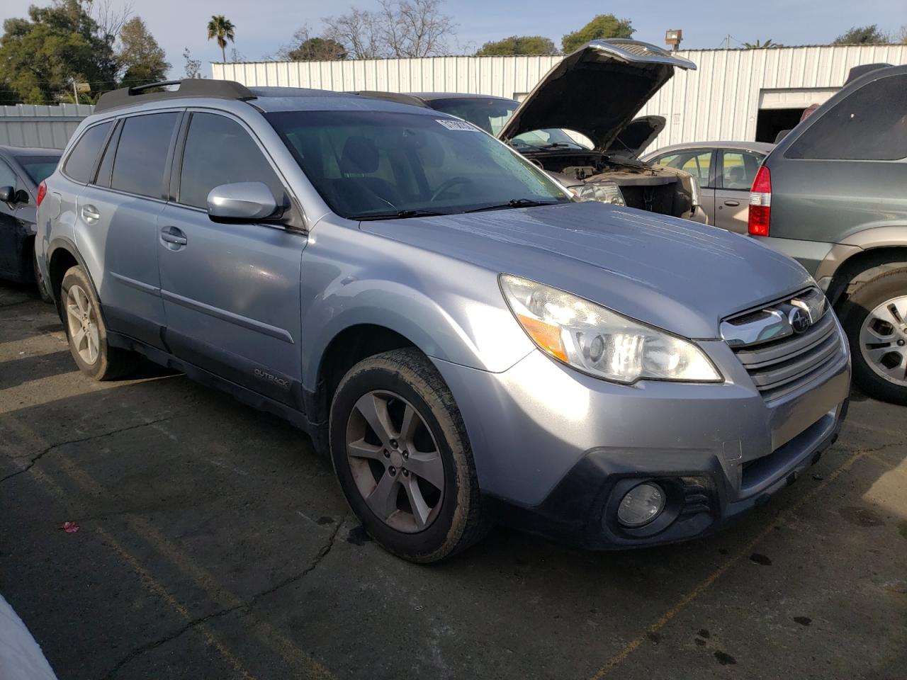 SUBARU OUTBACK 2014 with VIN 4S4BRCDCXE3311571 - Photo from auction