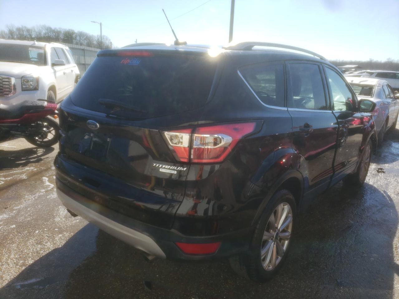 Photo 4 from auction – 2017 FORD ESCAPE TIT with VIN 1FMCU0J93HUC28850